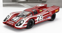 Rood Porsche 23 schaalmodel met Shell- en Goodyear-stickers, gepresenteerd door Vroomi voor verzamelaars.