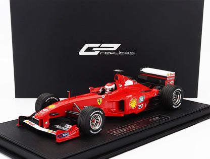 FERRARI - F1 F399 SCUDERIA FERRARI N 4 WINNER MALAYSIAN GP (with pilot figure) 1999 EDDIE IRVINE - RED