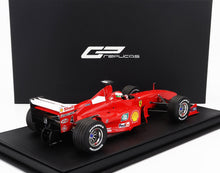 FERRARI - F1 F399 SCUDERIA FERRARI N 4 WINNER MALAYSIAN GP (with pilot figure) 1999 EDDIE IRVINE - RED