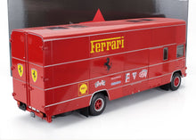 Red Ferrari racing team transporter truck model with sponsor logos, now accessible via Vroomi