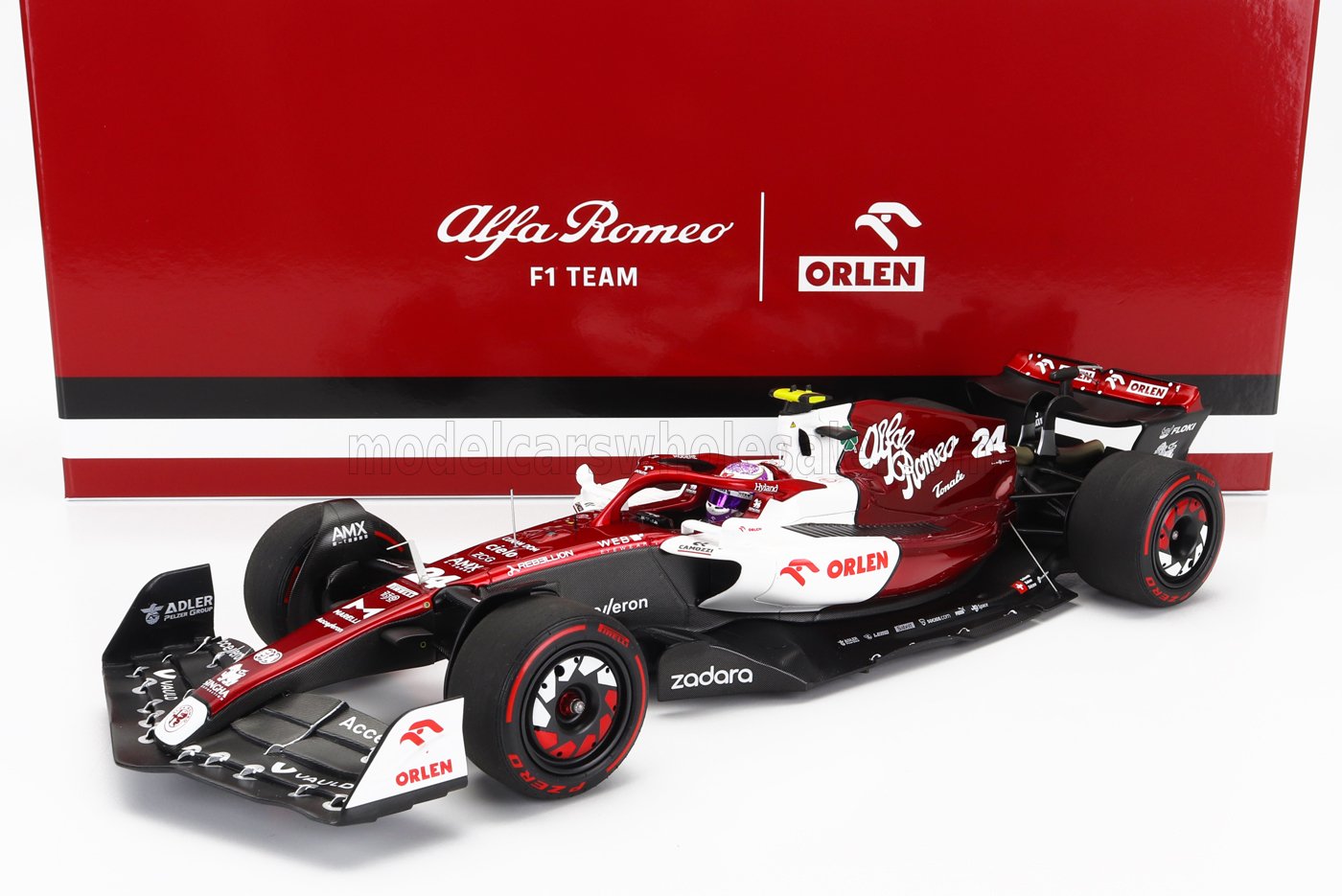 Alfa Romeo F1 Team racing car model in red and white with Orlen branding, available on Vroomi