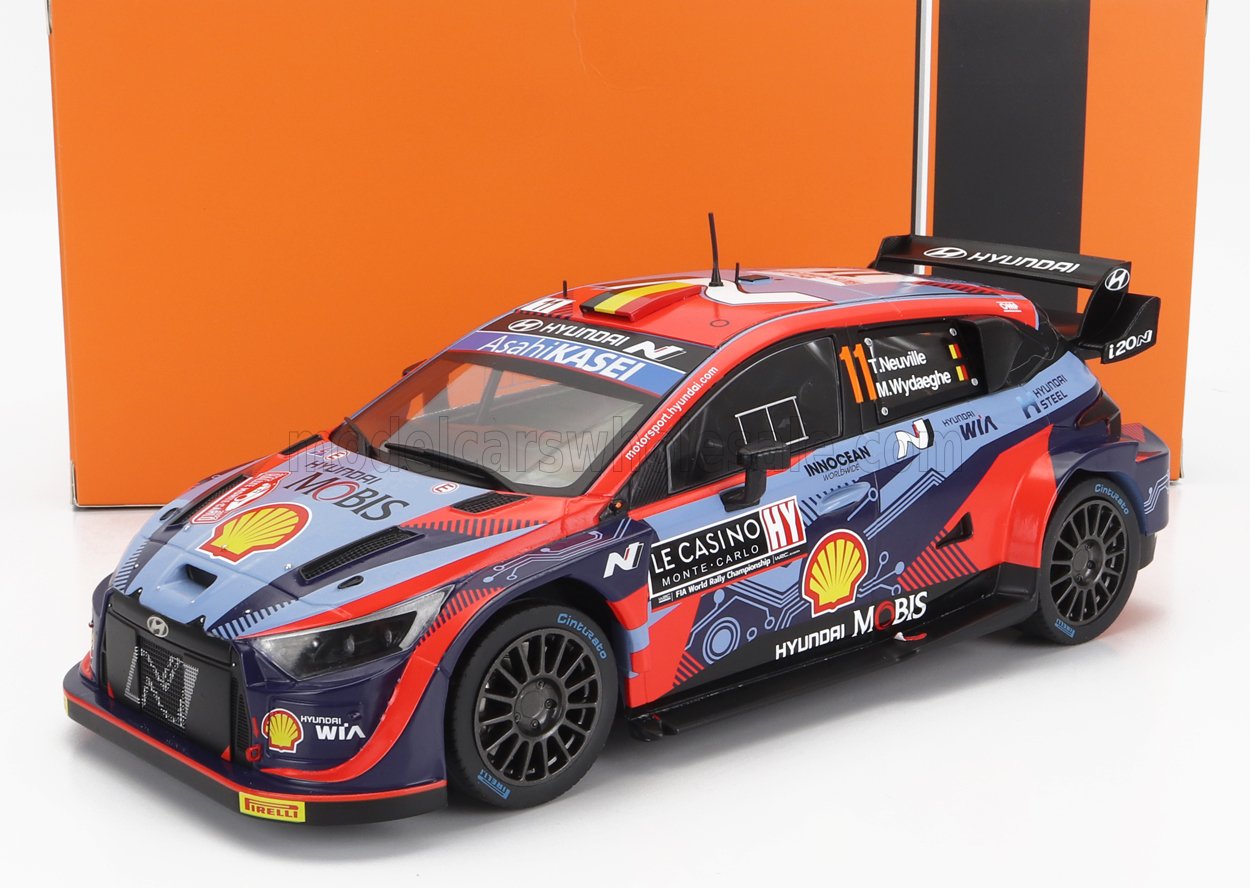 HYUNDAI  i20 COUPE WRC MOBIS N.º 11, 6.º RALLY DE MONTECARLO 2022, T. NEUVILLE - M. WYDAEGHE, BICOLOR AZUL Y ROJO. Maqueta de coche en Vroomi