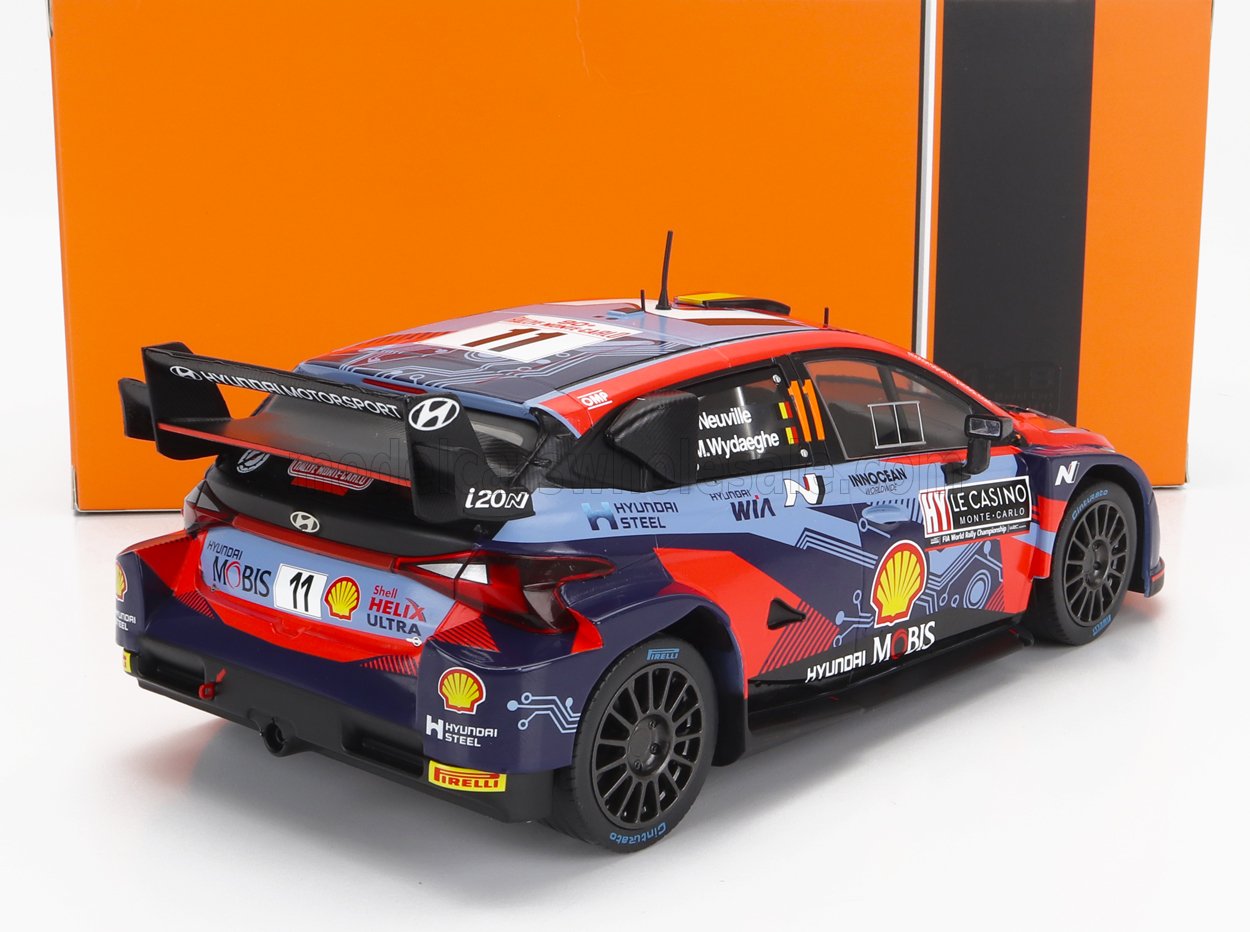 HYUNDAI  i20 COUPE WRC MOBIS N.º 11, 6.º RALLY DE MONTECARLO 2022, T. NEUVILLE - M. WYDAEGHE, BICOLOR AZUL Y ROJO. Maqueta de coche en Vroomi