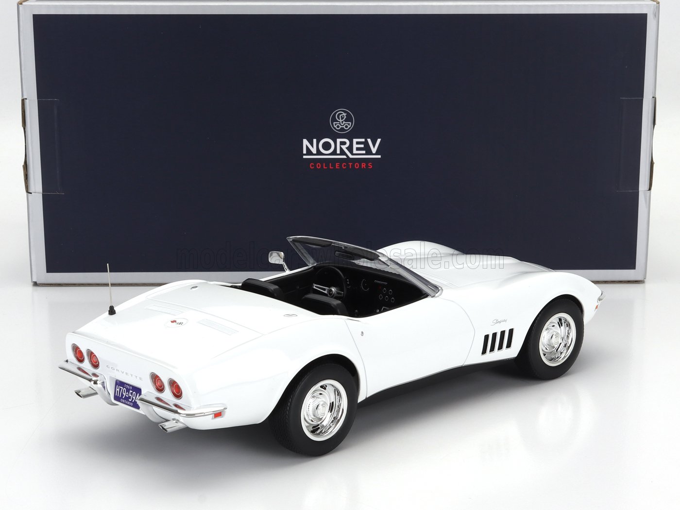 White 1969 Corvette convertible model car by Norev Collectors, available through Vroomi platform