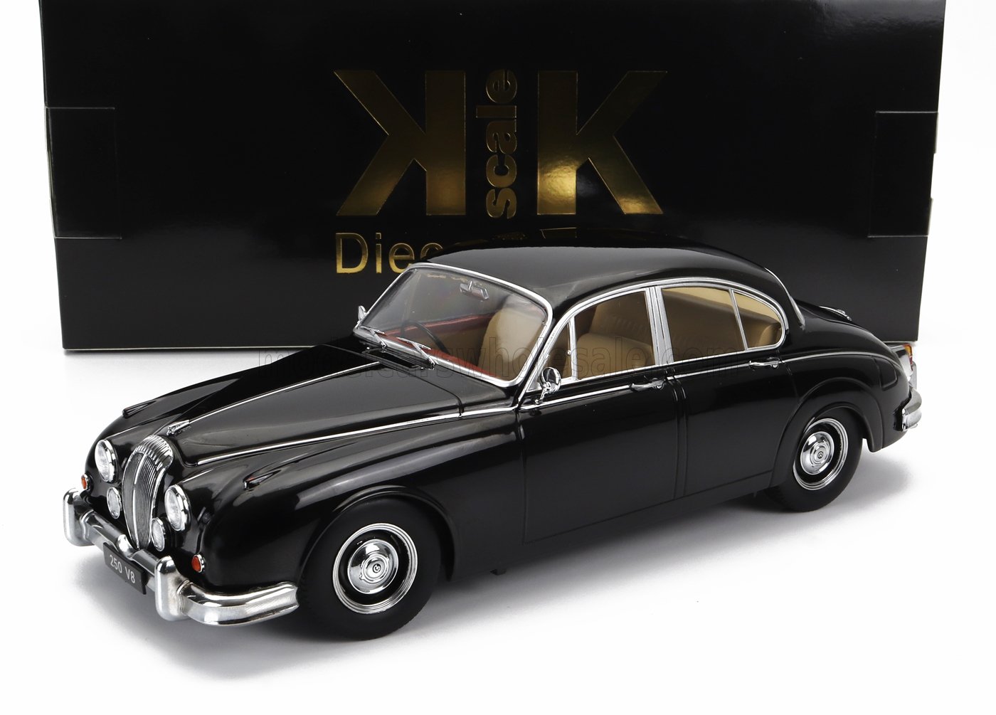 Black classic Jaguar 250 V8 model car with beige interior on white background, available via Vroomi