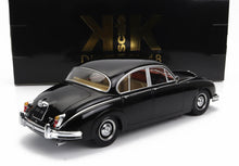 Black vintage 250 V8 model car by KK Scale, classic sedan with chrome details, offered on Vroomi