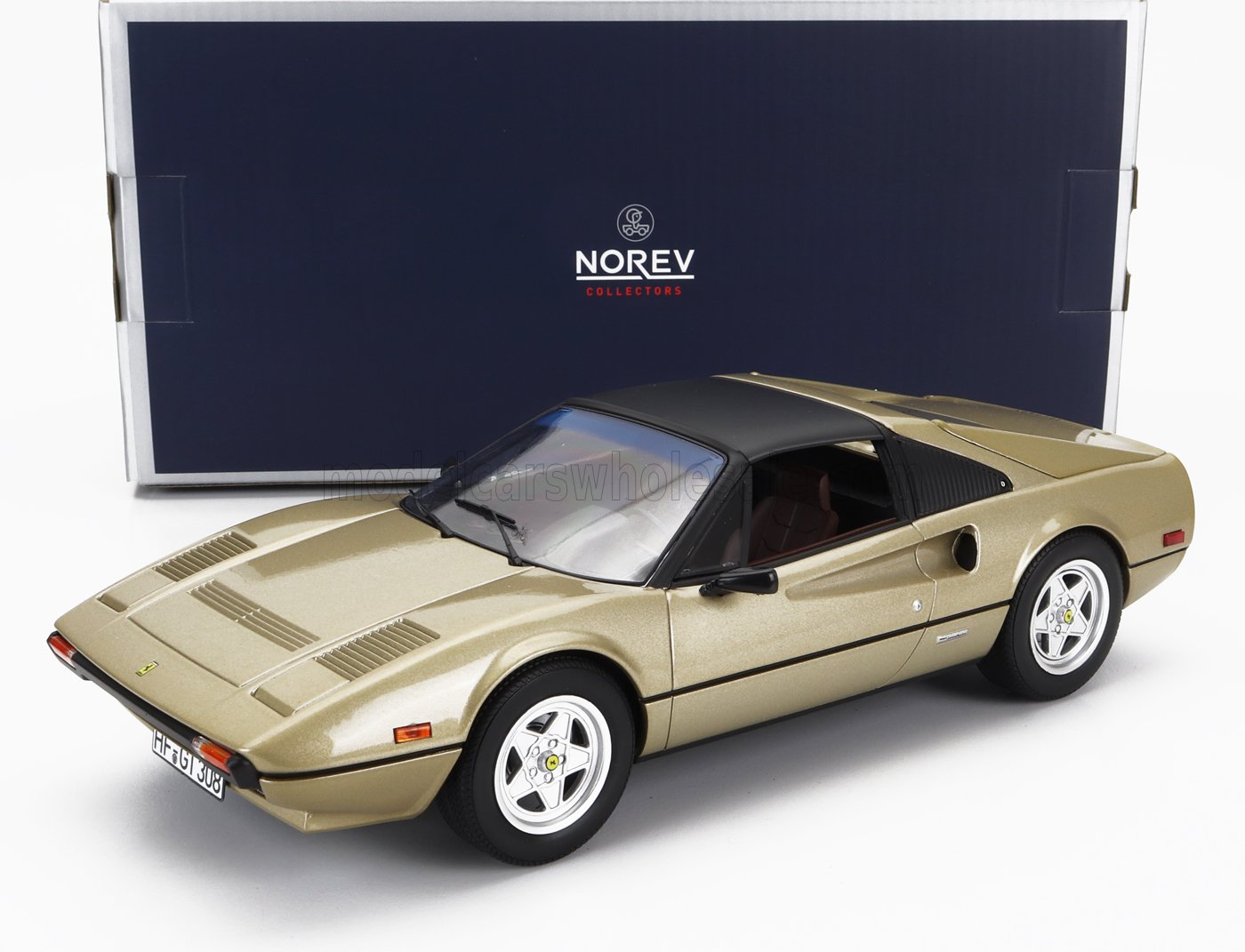 Gold Norev Collectors model of classic Ferrari sports car with black roof, available through Vroomi
