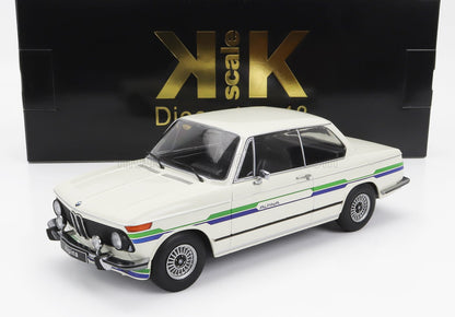 White BMW Alpina 2002 model car with green and blue stripes, displayed in front of black KK Scale box, also available on Vroomi