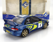 SUBARU - IMPREZA STI WRC N 4 WINNER RALLY MONTECARLO 1997 PIERO LIATTI - FABRIZIA PONS - BLUE MET YELLOW