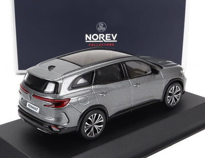 Silver Renault SUV scale model on black stand with Norev Collectors box, available on Vroomi