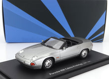 Silver Porsche 928 Cabrio Prototype model car on display stand, available at Vroomi