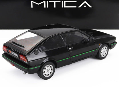 Black Alfa Romeo GTV model car with green side stripe, silver rims, and rear license plate, offered on Vroomi