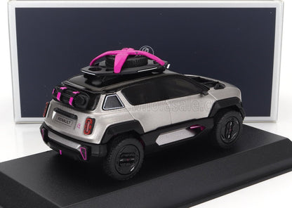 Renault concept SUV model with silver body and pink accents on display stand, now offered on Vroomi