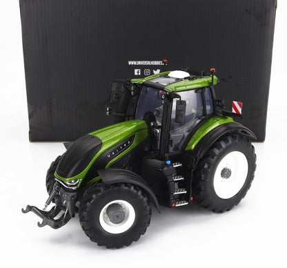 Detailed 1/18 scale Valtra green and black tractor model with white wheels, showcased with black background, offered on Vroomi
