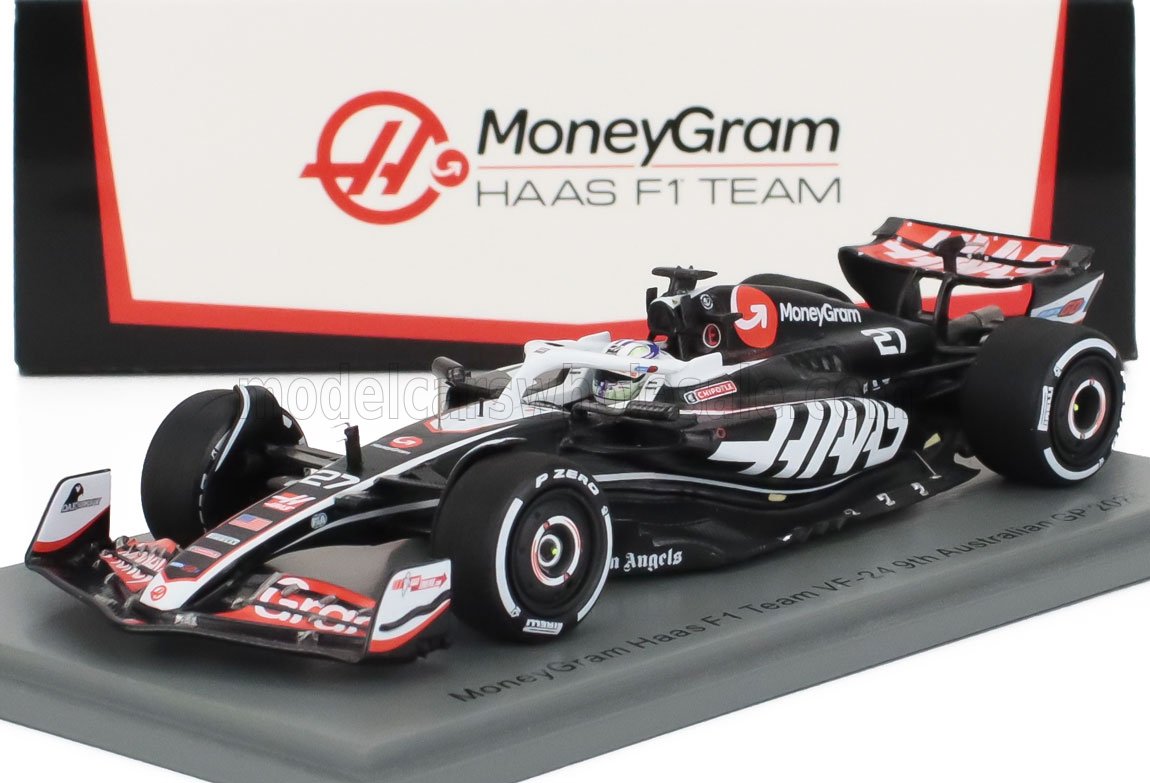 Scale model of MoneyGram Haas F1 Team VF-24 race car with sponsor logos, available on Vroomi platform
