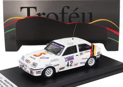 White Vauxhall Chevette rally car model with decals and number 42, displayed on platform, offered via Vroomi