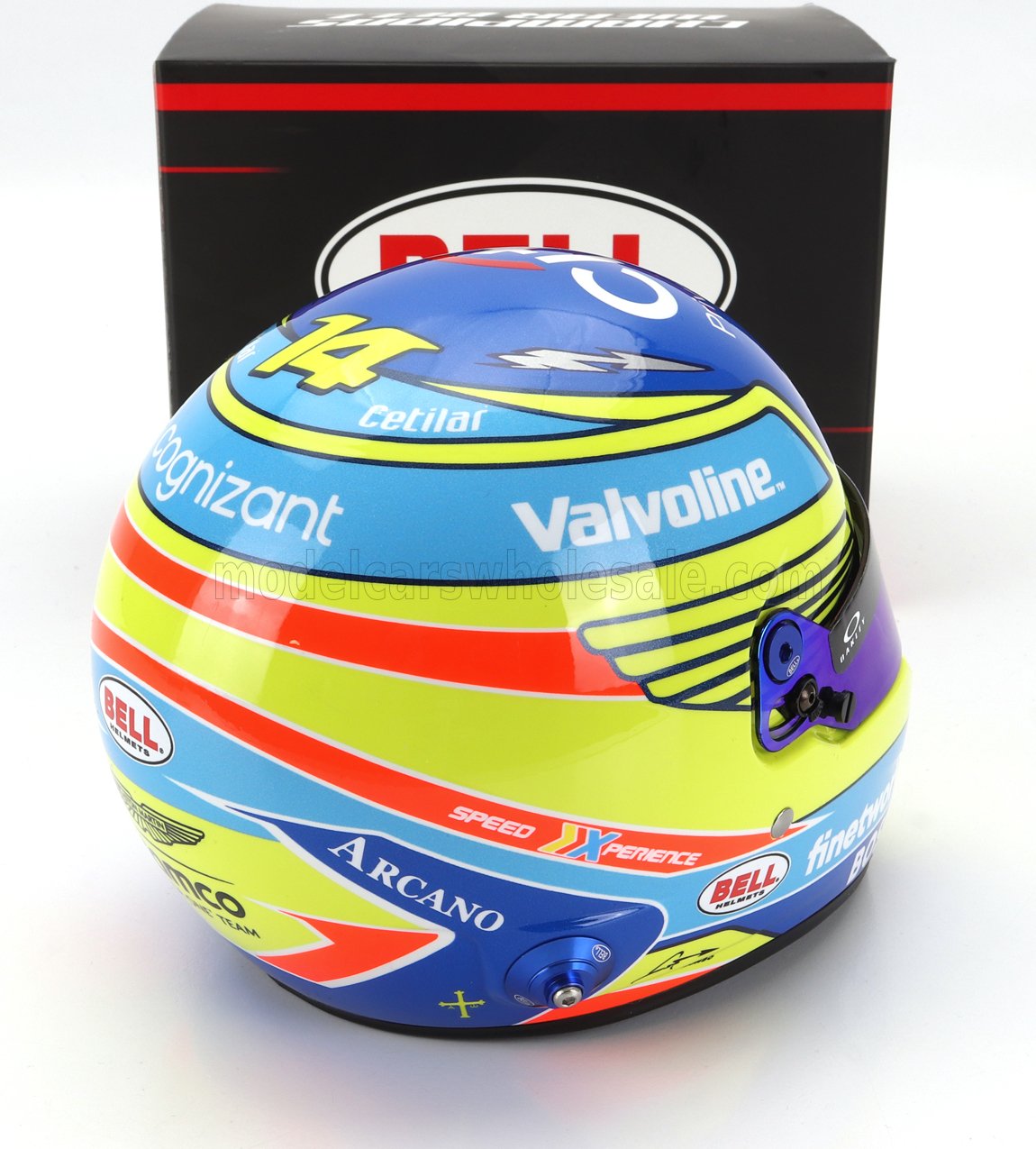 Fernando Alonso 2023 F1 helmet scale model car replica, vibrant blue-yellow design with Valvoline, Cognizant, Bell logos, displayed with original box