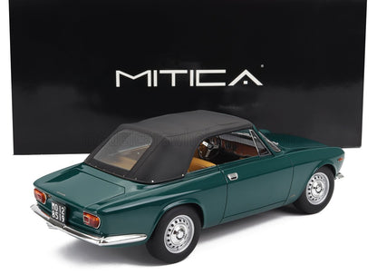 Detailed green classic convertible model car with black soft top and tan interior, offered on Vroomi