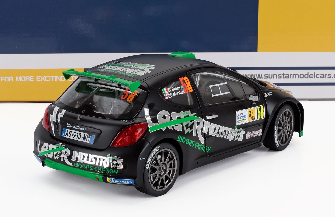 1/18 scale Peugeot rally car die-cast model, Laser Industries livery, available at Vroomi
