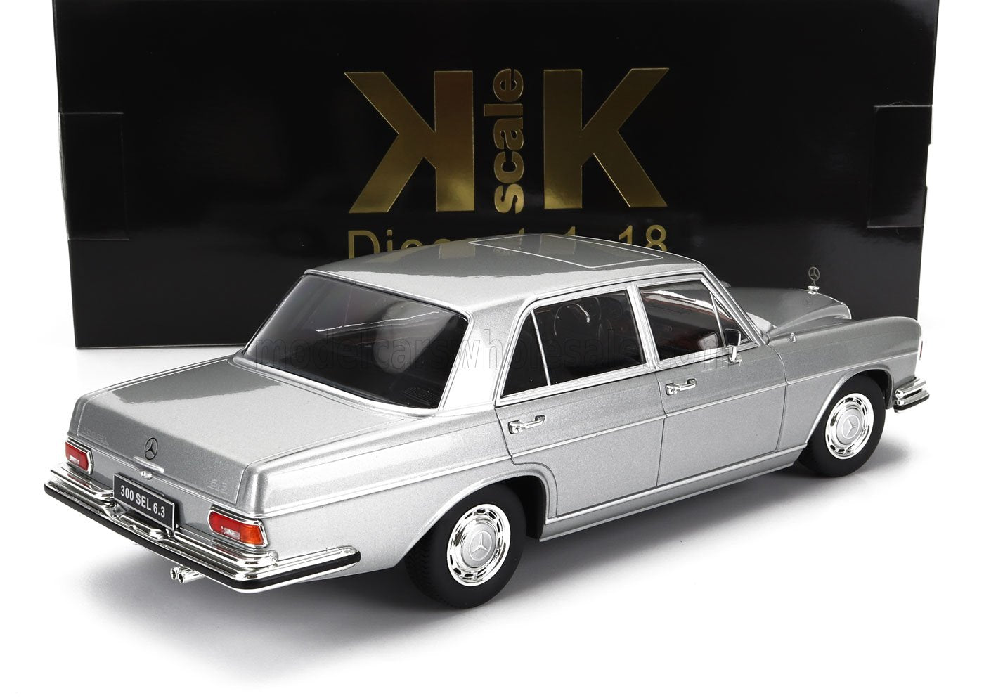 Silver 1:18 scale Mercedes-Benz 300 SEL 6.3 model car with detailed exterior, featured on Vroomi