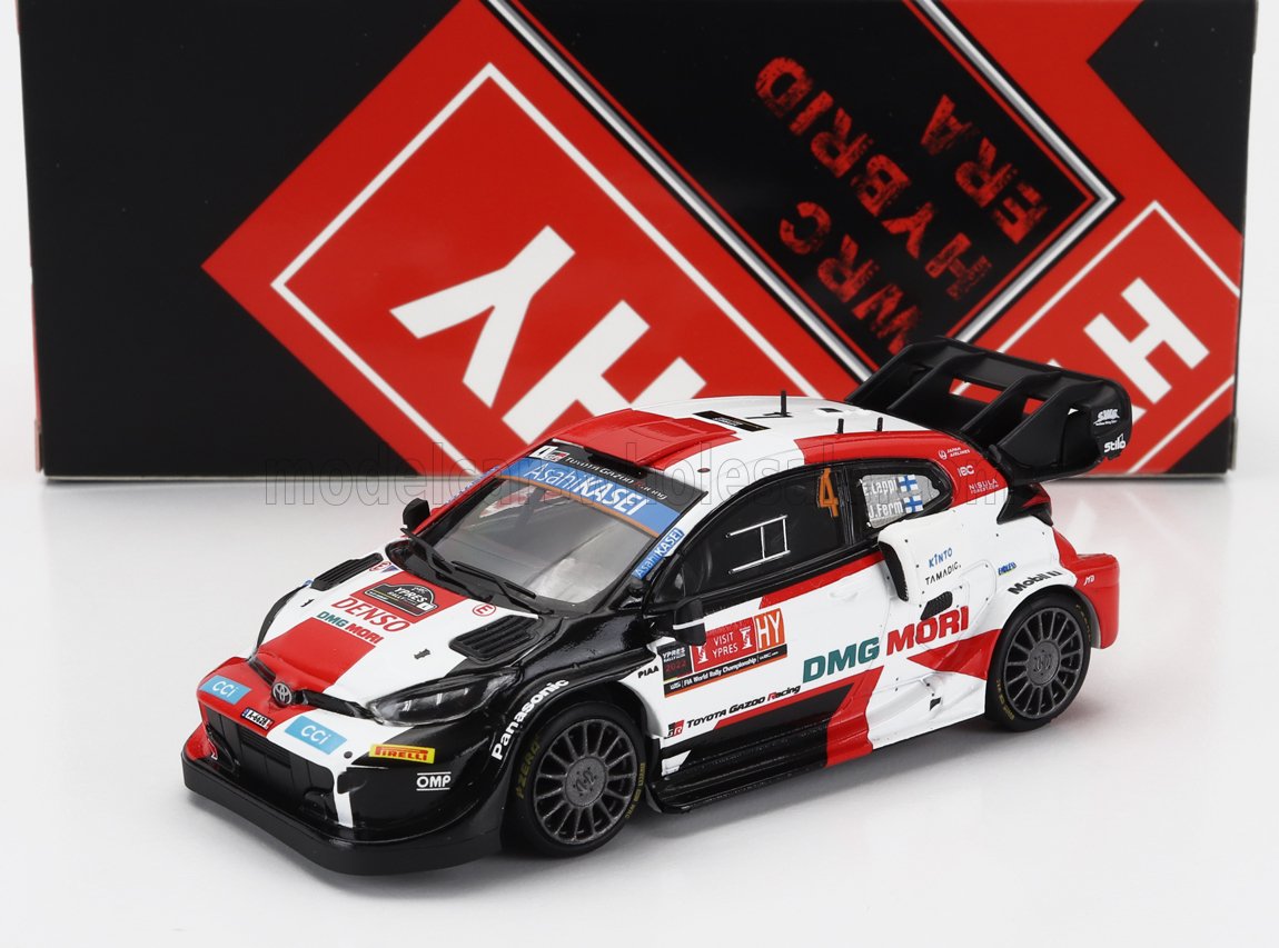 Voiture miniature Toyota GR Yaris Rally1 avec livrée DMG MORI, présentée avec le coffret WRC Hybrid — Vroomi