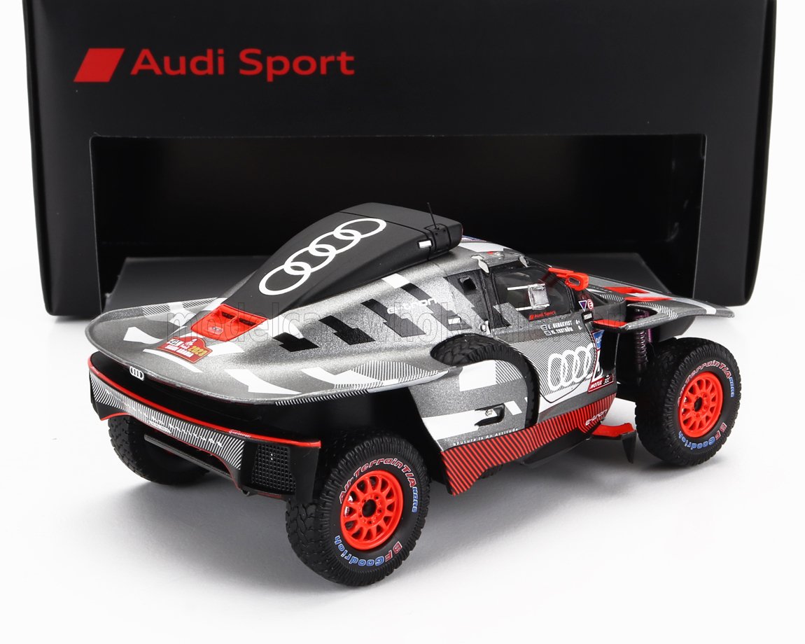 Audi Sport futuristic off-road racing car model with black, red, and silver design available through Vroomi