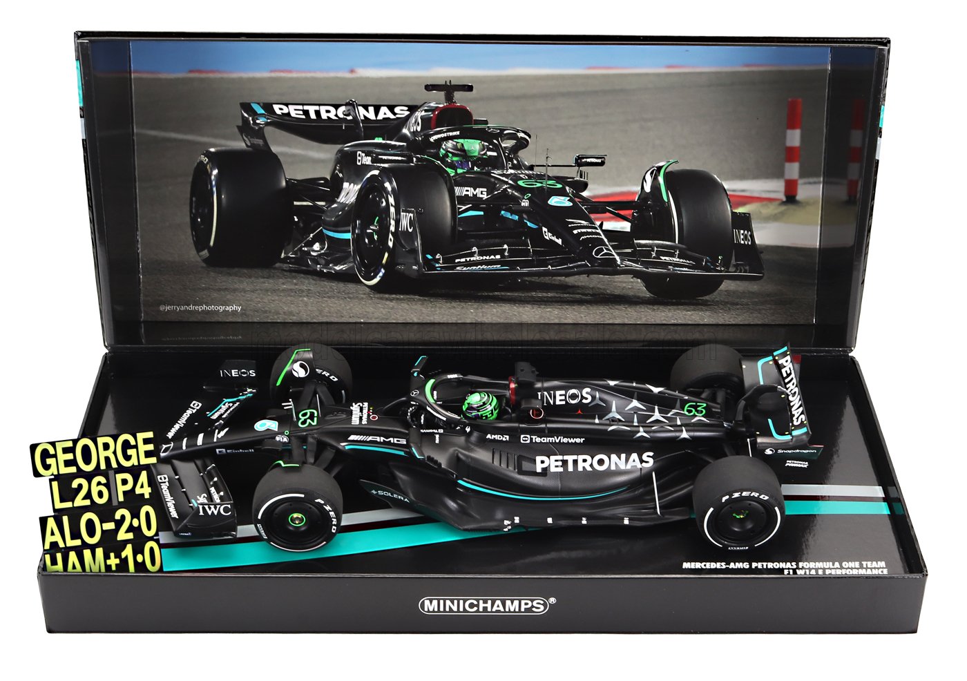 Minichamps 1:18 Mercedes-AMG Petronas F1 W14 model car with George Russell decals, shown with race photo, offered on Vroomi