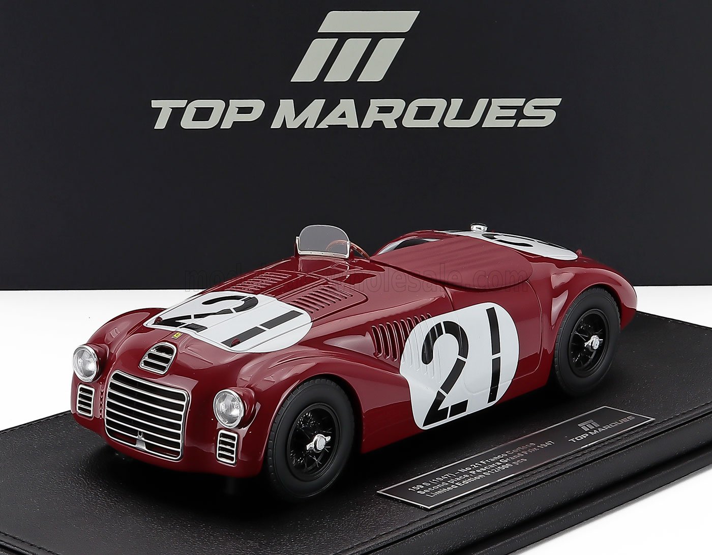 Red vintage race car scale model with number 21, available now for collectors on Vroomi.