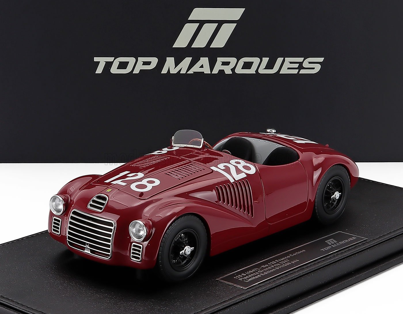 Detailed 1/18 red vintage racing car scale model with number 128, available for collectors on Vroomi.