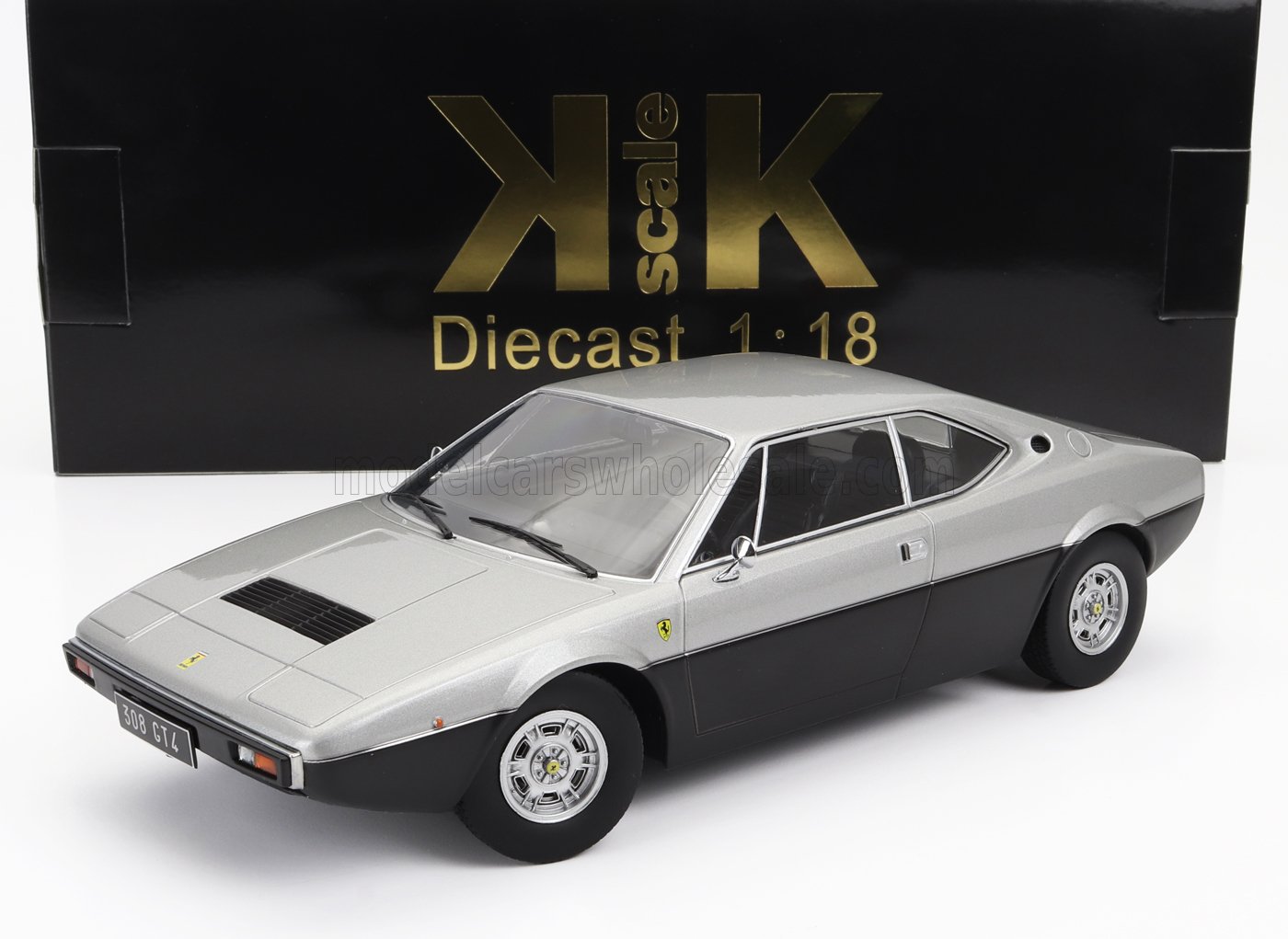 Silver and black 1:18 scale diecast Ferrari 308 GT4 model car with detailed rims, available via Vroomi