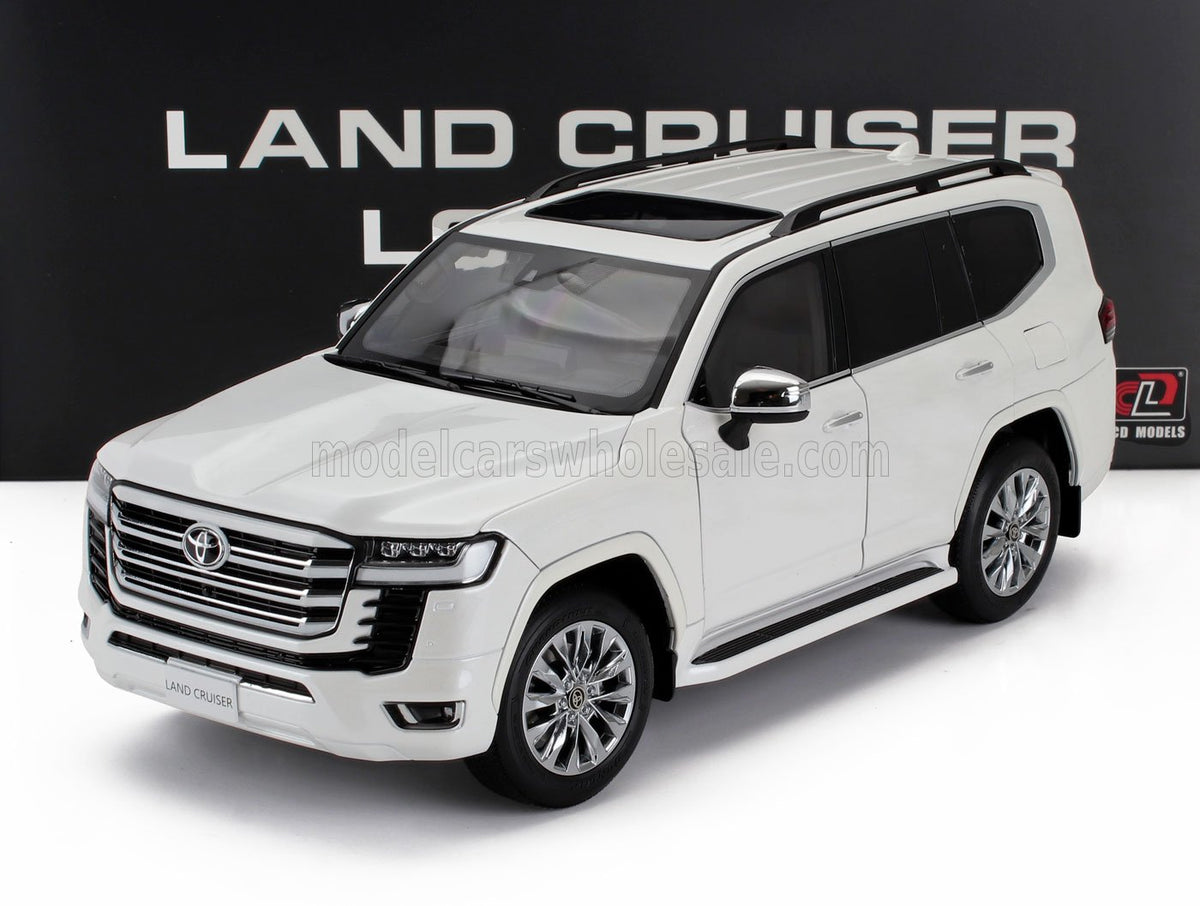 Voiture miniature Toyota Land Cruiser blanche, réplique die-cast détaillée présentée par Vroomi
