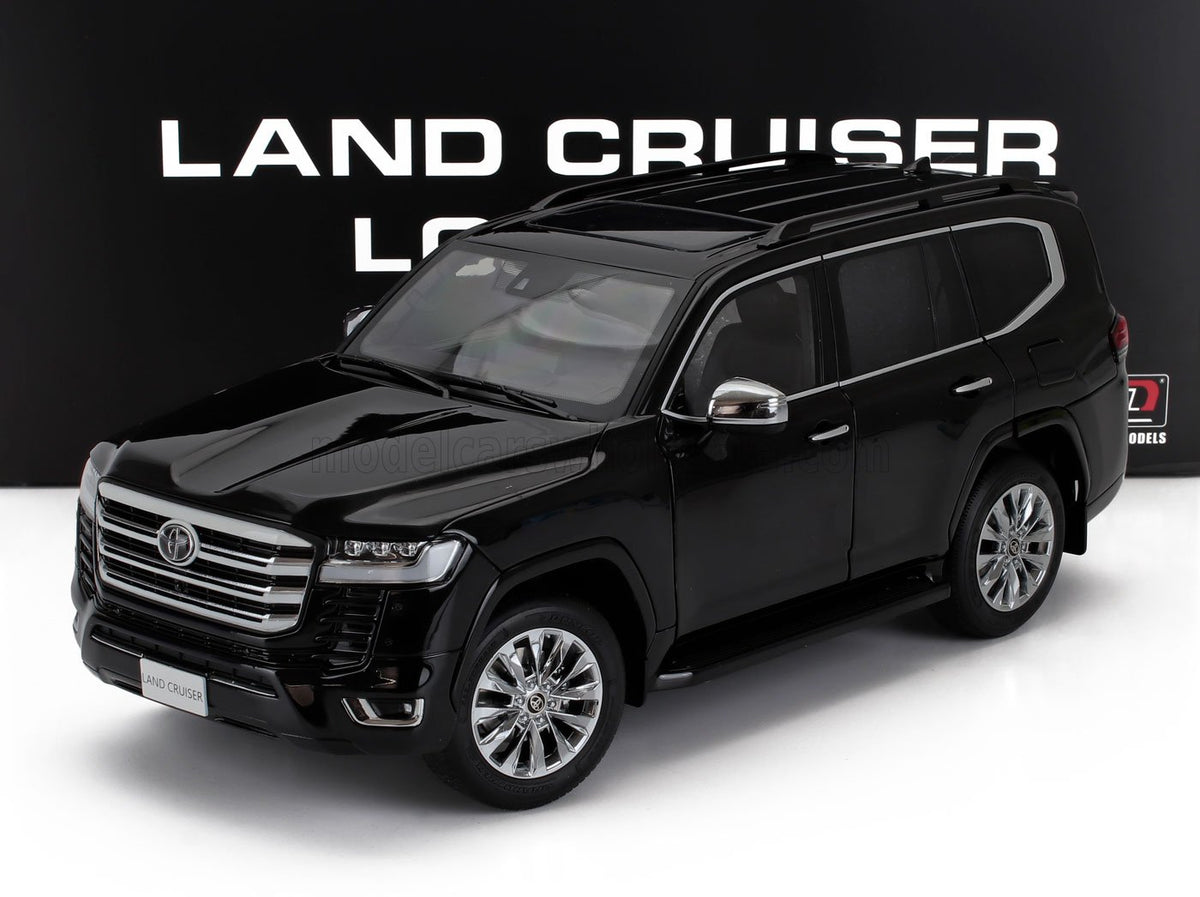 Voiture miniature Toyota Land Cruiser noire par Vroomi, réplique die-cast détaillée avec jantes chromées