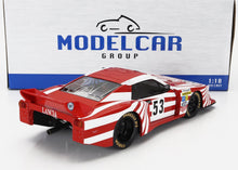 1:18 scale Lancia model race car in red and white with number 53, displayed by ModelCar Group, available at Vroomi