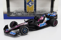 Modellino in scala Alpine F1 Team A524 con livrea BWT, esposto nella confezione Vroomi per collezionisti