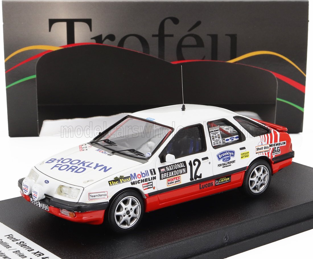 Ford Sierra XR4 rally car model with Brooklyn Ford livery, displayed on black base, available at Vroomi