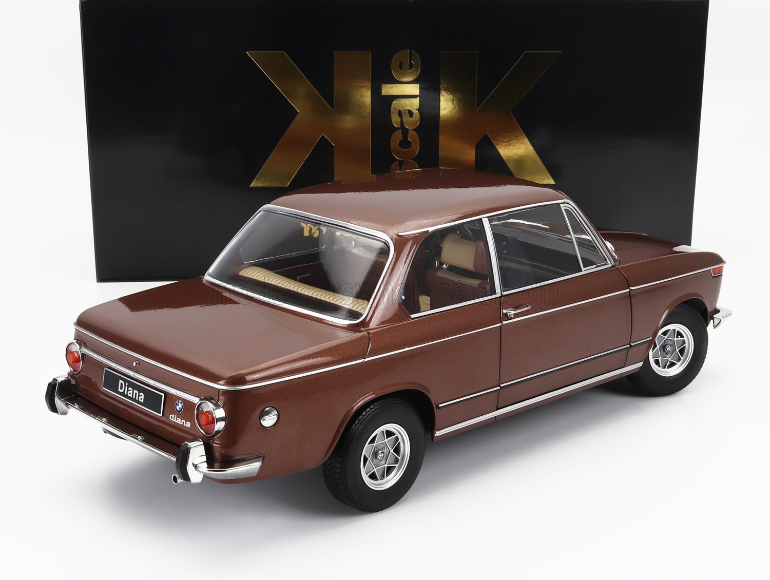 Brown vintage BMW Diana model car with chrome details, displayed with K Scale packaging, available on Vroomi