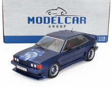 Dark blue 1:18 scale die-cast Rieger Scirocco GTO model car with wolf moon hood art, displayed with Modelcar Group box, available at Vroomi