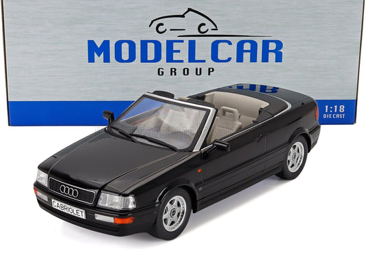 Maqueta de coche Audi Cabriolet negro a escala 1:18 de Modelcar Group, perfecta para los coleccionistas de Vroomi
