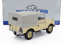modellino , in scala 1:18, della serie I “ Land Rover ”, color crema con capote in tela, di Vroomi
