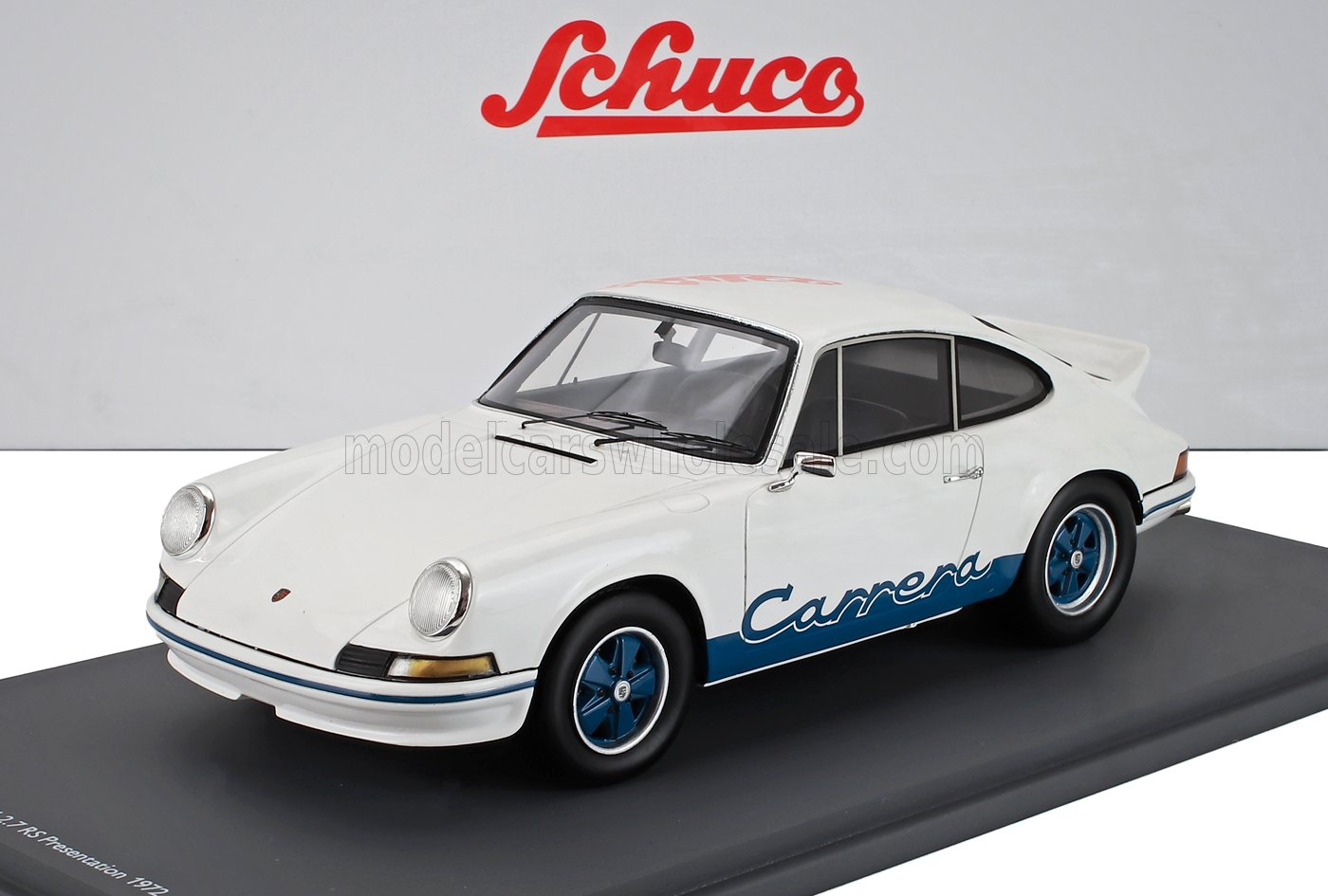 White Porsche Carrera model car with blue detailing and blue wheels, displayed on black stand, available on Vroomi