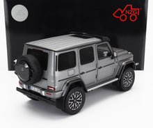 MERCEDES BENZ - CLASE G G63 4x4 AMG 2023 - PLATIN MAGNO GREY Maqueta de coche en Vroomi