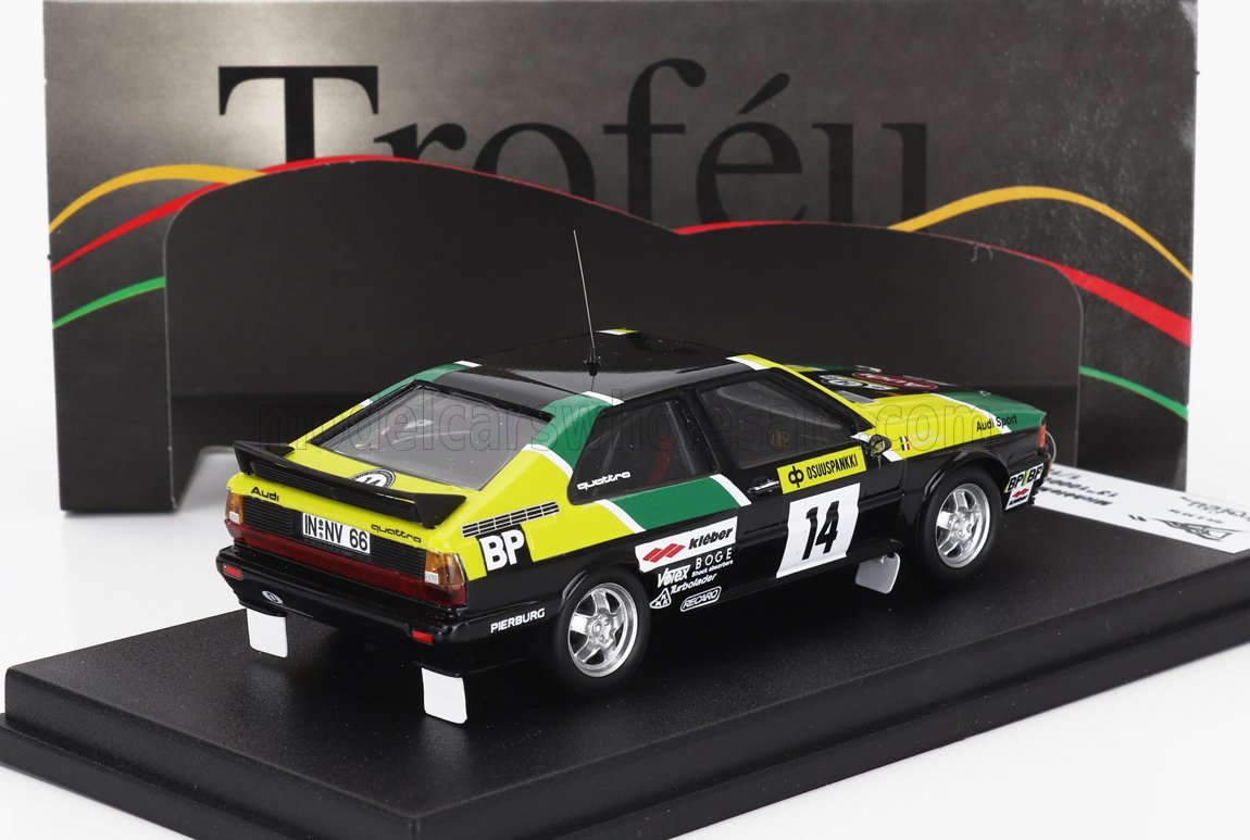1:43 scale die-cast Audi rally car model, green and yellow livery, detailed race decals, available now