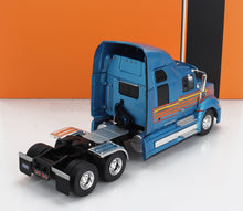 WESTERN STAR - TRACTEUR ROUTIER 5700 EX À 3 ESSIEUX 2009 - BLEU CLAIR MÉTALLISÉ ET ROUGE