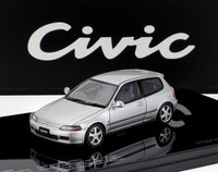Modellino in scala Honda Civic argento su base riflettente con sfondo 'Civic', Vroomi