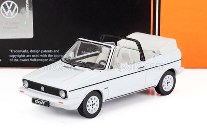 White Volkswagen Golf convertible model car with black trim, displayed with official packaging, available on Vroomi