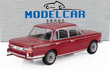 Red BMW 2000 TiLUX scale model car rear side view with detailed wheels and chrome trim available at Vroomi