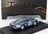 Voiture miniature 1:43 bleue, numéro de course 173, présentée sur socle noir avec boîte Troféu — Vroomi