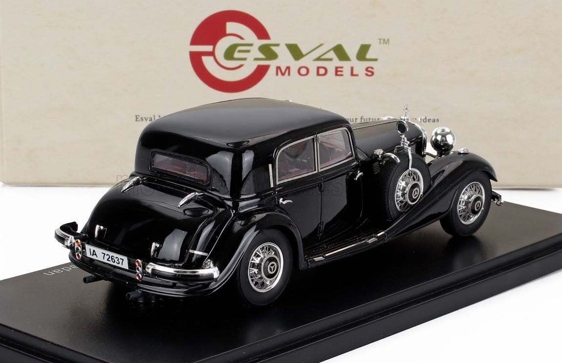 Black vintage Mercedes model car by Esval Models displayed on a stand, now available through Vroomi