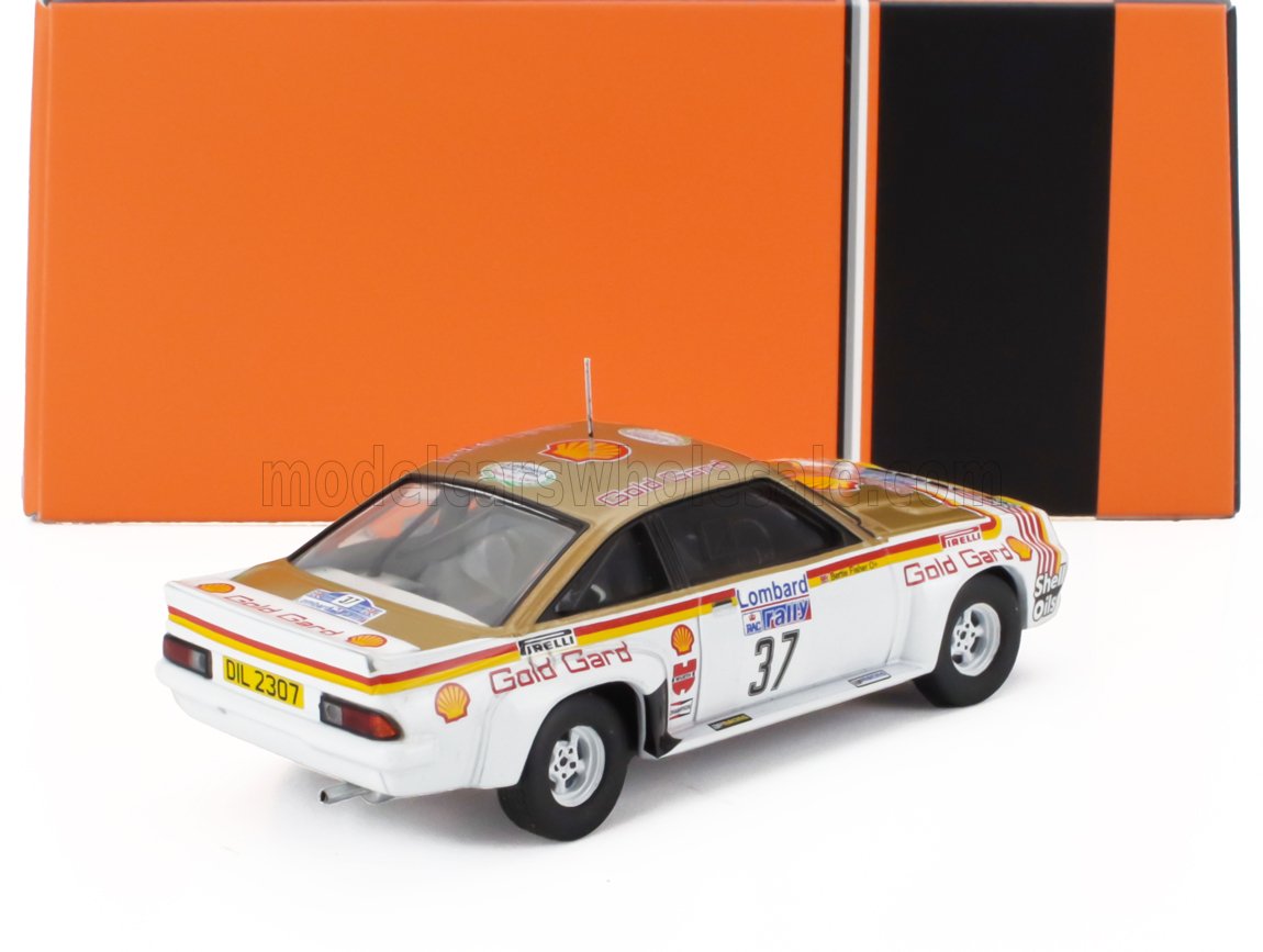 Voiture miniature blanche et dorée aux couleurs Shell et Gold Gard, présentée chez Vroomi