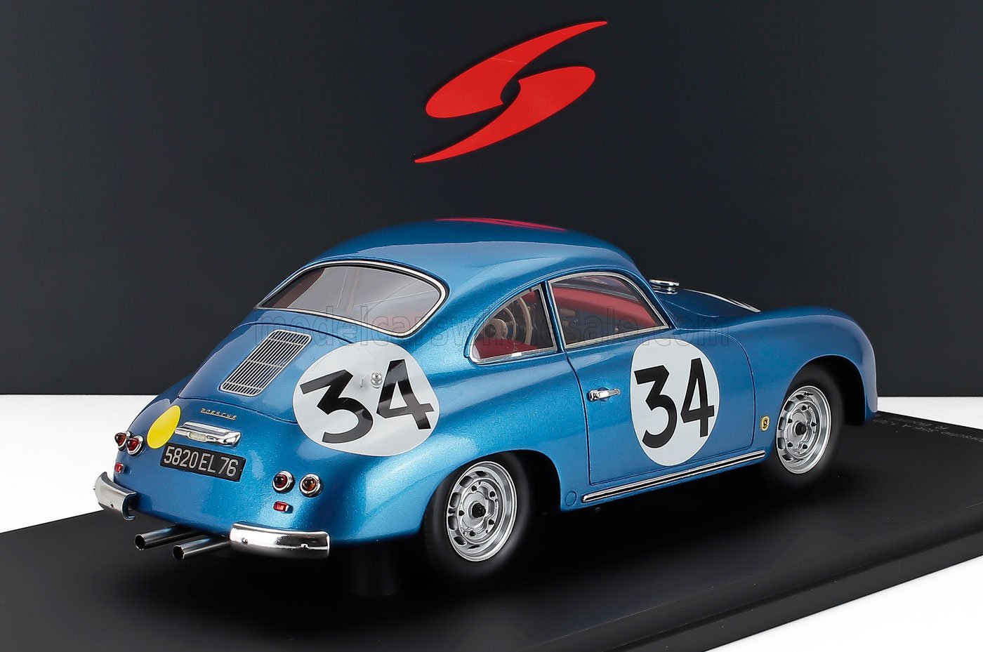 Blue Porsche 356 classic race car model with number 34, showcased on black platform, also on Vroomi